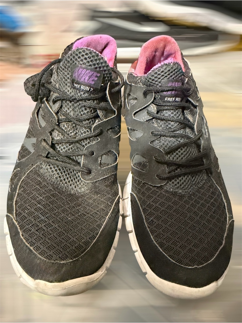 Nike Women’s Black and Pink Free Run Lightweight Sneakers